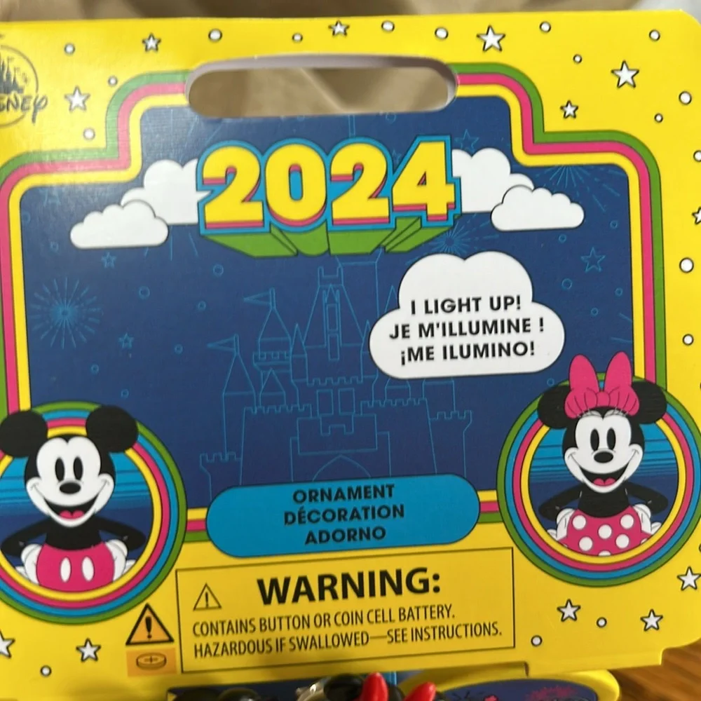 Disney 2024 lighted Christmas ornament.  Excellent condition.  New in box.